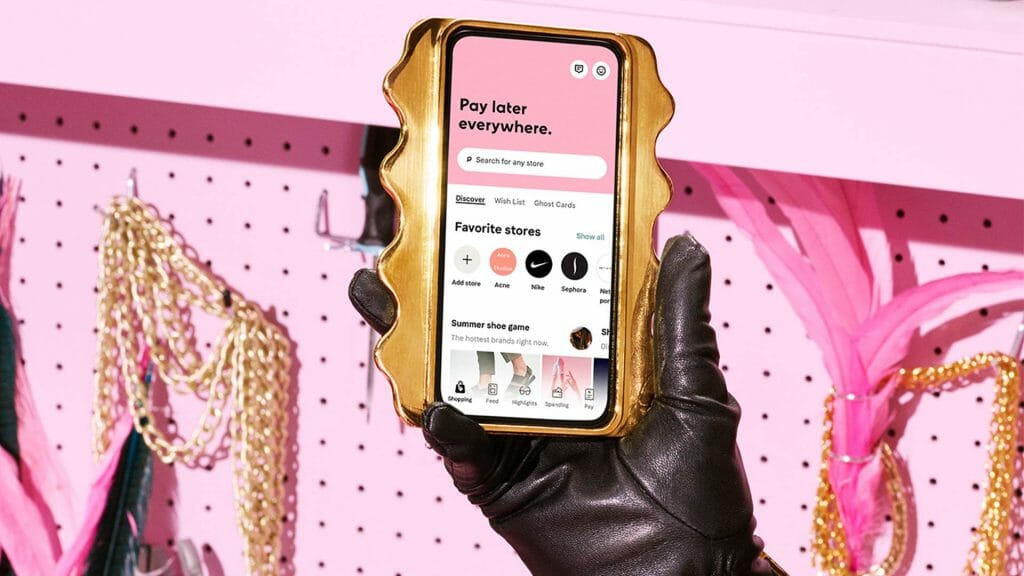 Smartphone showcasing Klarna's shopping app.