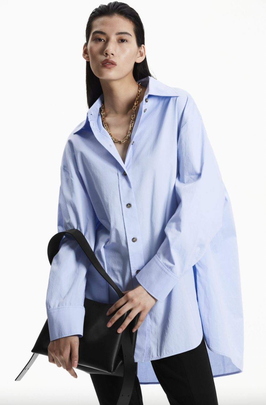 model wearing oversized shirt from cos