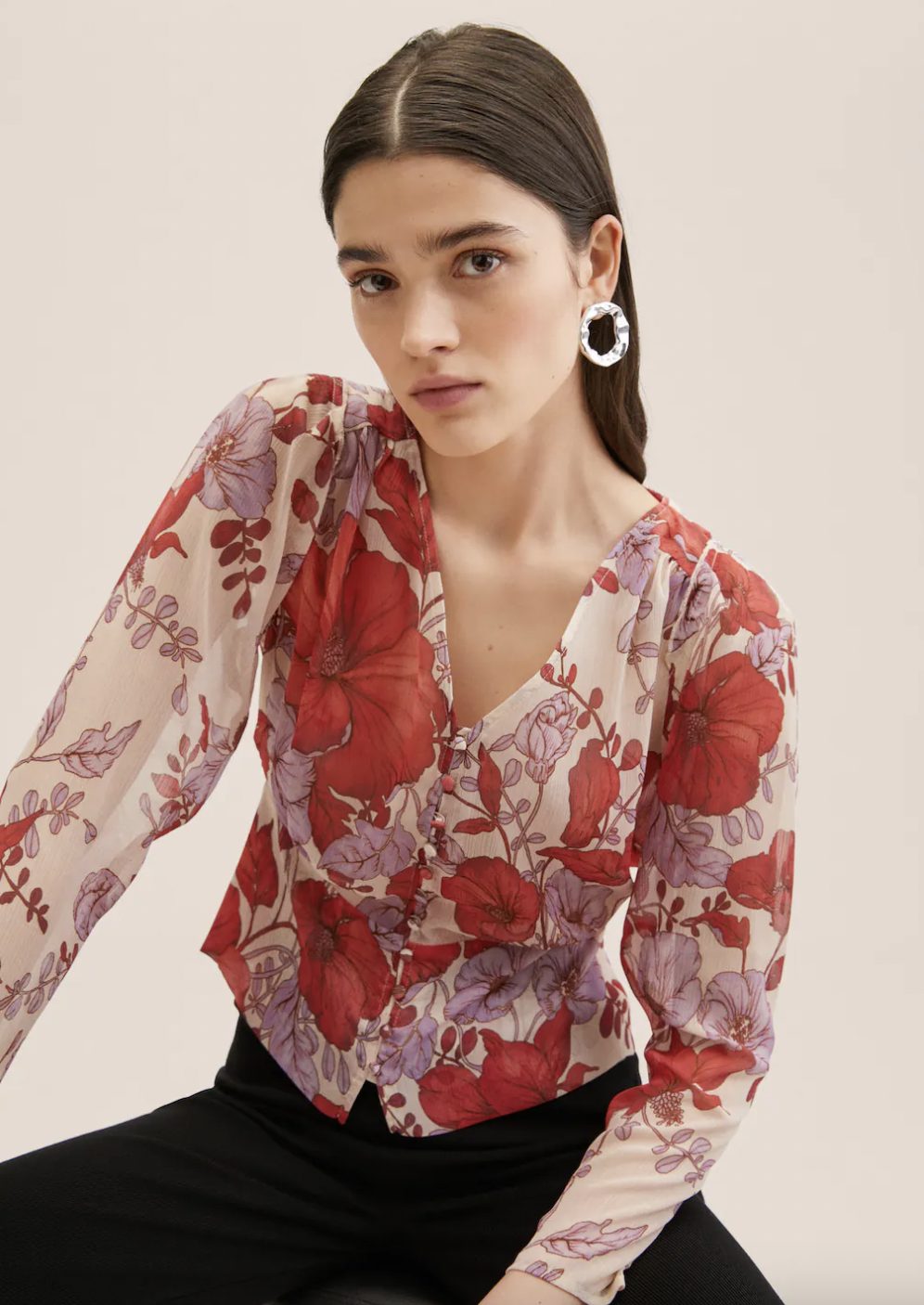 model wearing floral print blouse from mango
