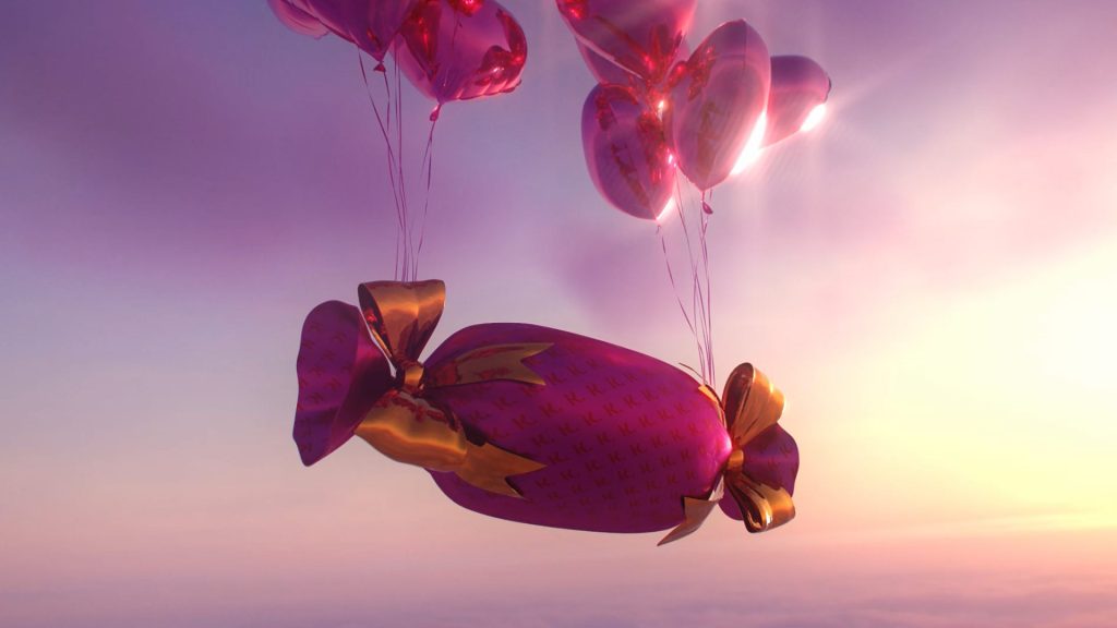 Pink candy with floating balloons