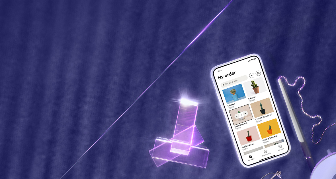 Point of sale appen visas på telefonskärm, telefonen placerad på lila bakgrund
