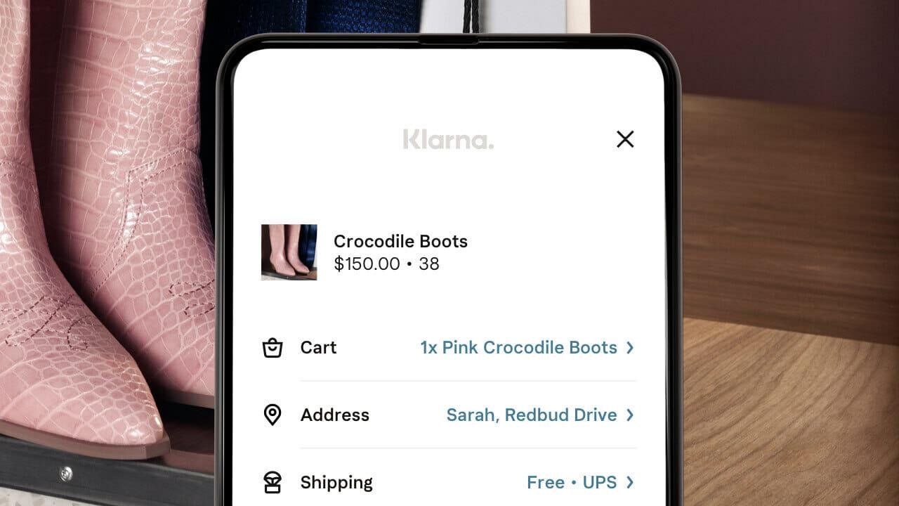 Klarna's Complete your purchase screen over cowboy boots