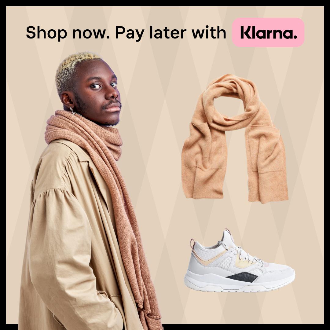 Image showing model wearing scarf bought with Klarna's shop now pay later