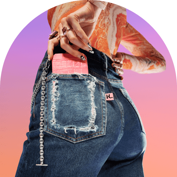 Phone in jeans back pocket with Klarna logo