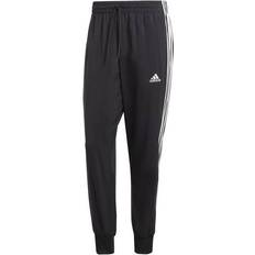 Adidas Trainingsbekleidung Hosen adidas Sportswear Aeroready Essentials Tapered Cuff Woven 3-Stripes Pants - Black/White