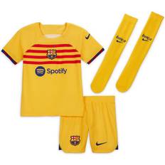 Junior Fotballsett Nike FC Barcelona 2022/23 Fourth-fodboldsæt til mindre børn gul