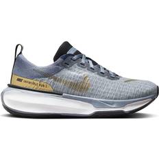 Gold Sneakers Nike Women's Invincible Road Running Shoes in Blue, DR2660-400