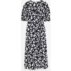 H&M Crêpe-Kleid mit Puffärmeln Schwarz/Geblümt, Alltagskleider in Größe XXL. Farbe: Black/floral