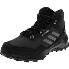 Adidas Dame Tursko adidas Women's TERREX AX4 Mid GORE-TEX Hiking Shoes, Cblack/Grethr/Minton
