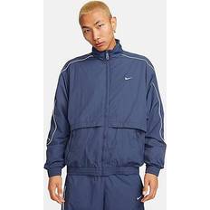 Nike Men's Sportswear Solo Swoosh Woven Track Jacket in Blue, FB8622-437