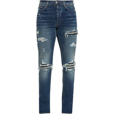 Amiri Pants & Shorts Amiri MX1 Destroyed Skinny Jeans - Deep Class