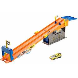 Hot Wheels Rooftop Race Garage Playset, Race to the Finish Line then Pull Into the Garage for a Tune-up with the Rooftop Race Garage! Orange