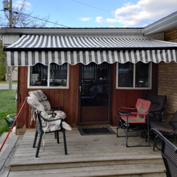 Aleko Black Frame 13 ft Retractable Home Patio Canopy Awning